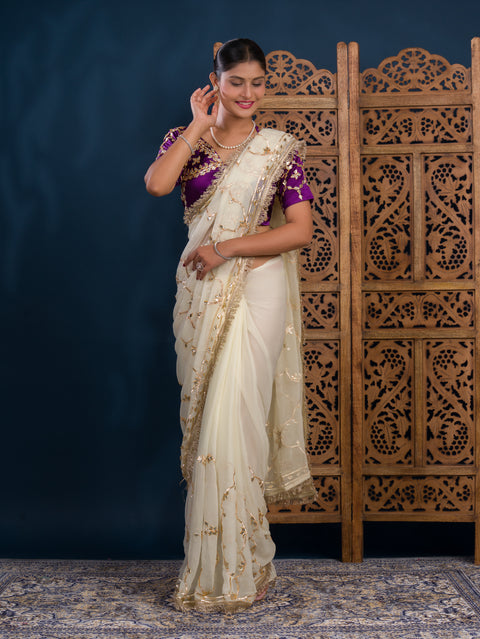 By Traditional  Saree