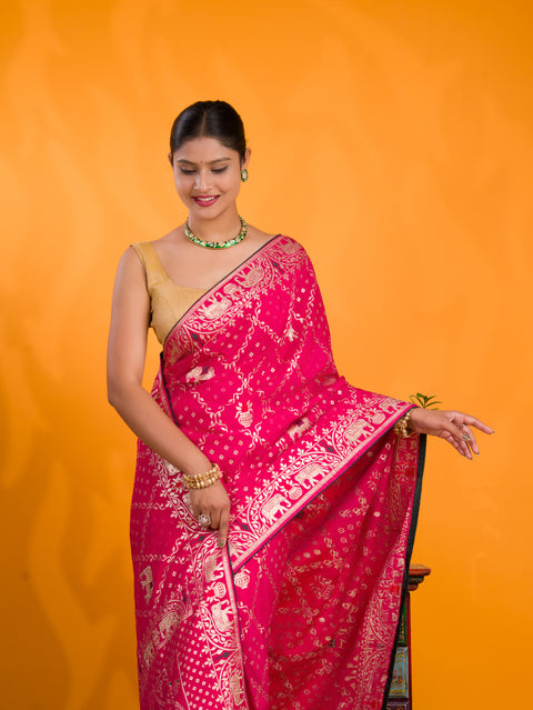 A traditional Dola Silk Banarasi Style With Stone Work Saree in pink colour