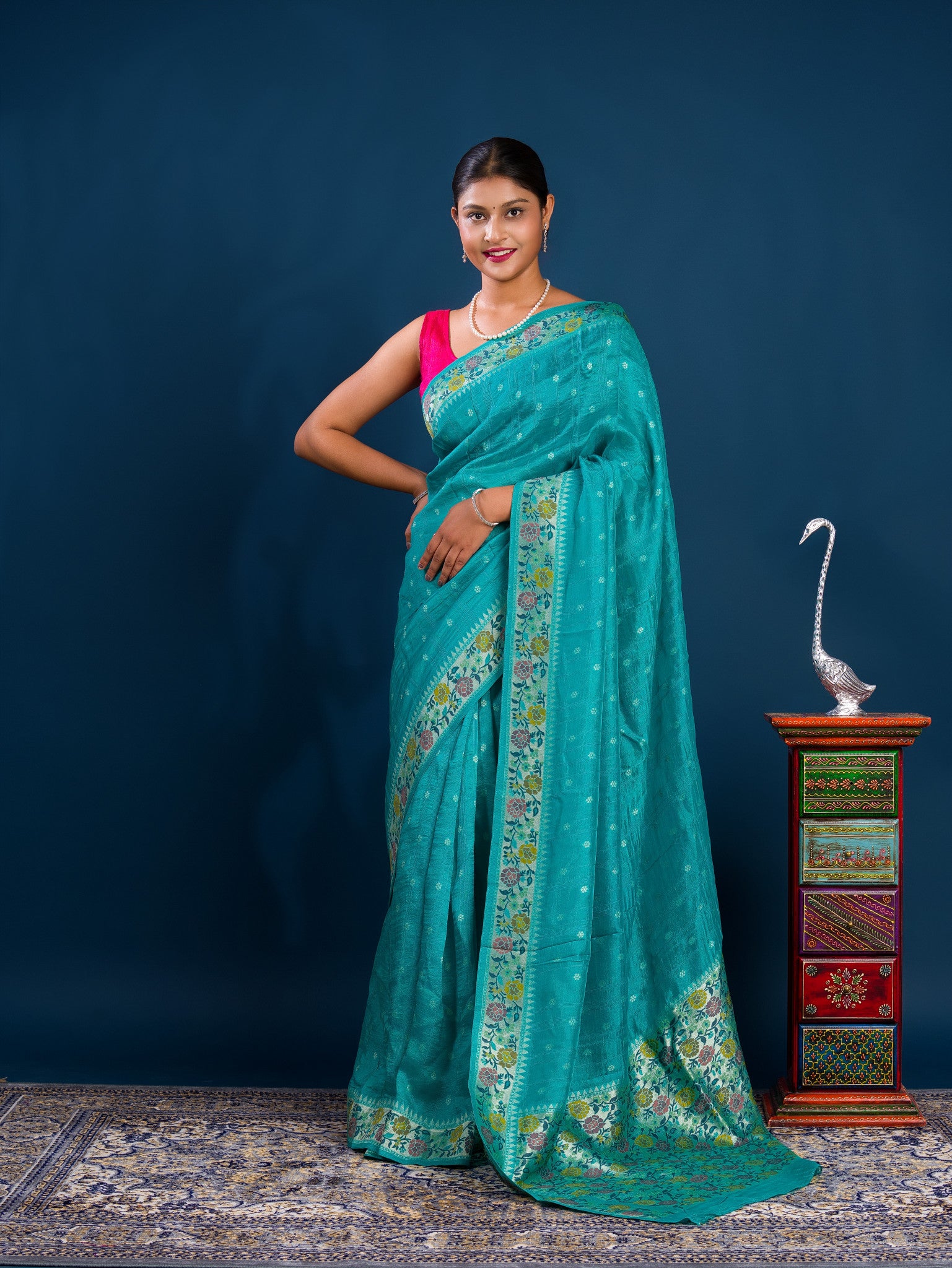 A teal saree with floral patternsBanarasi Silk Printed Style With zari weaving Work Saree 