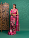 A saree with a kalamkari style pattern in pink colors, with zari weaving and a Banarasi border.