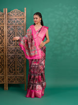 A saree with a kalamkari style pattern in pink colors, with zari weaving and a Banarasi border.