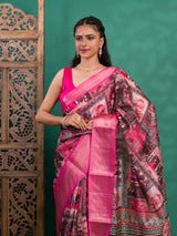 A saree with a kalamkari style pattern in pink colors, with zari weaving and a Banarasi border.