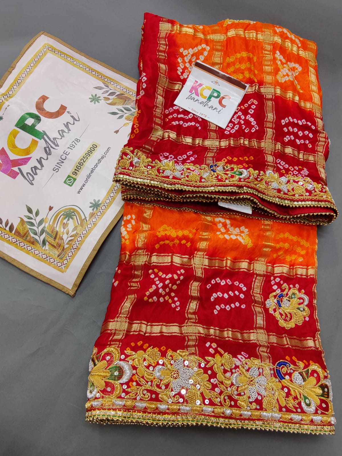 KcPc Mahajani Trending Pure Gaji Silk Bandhani Zardoji Ghatchola Chunri Pila Odhna (Red Orange)