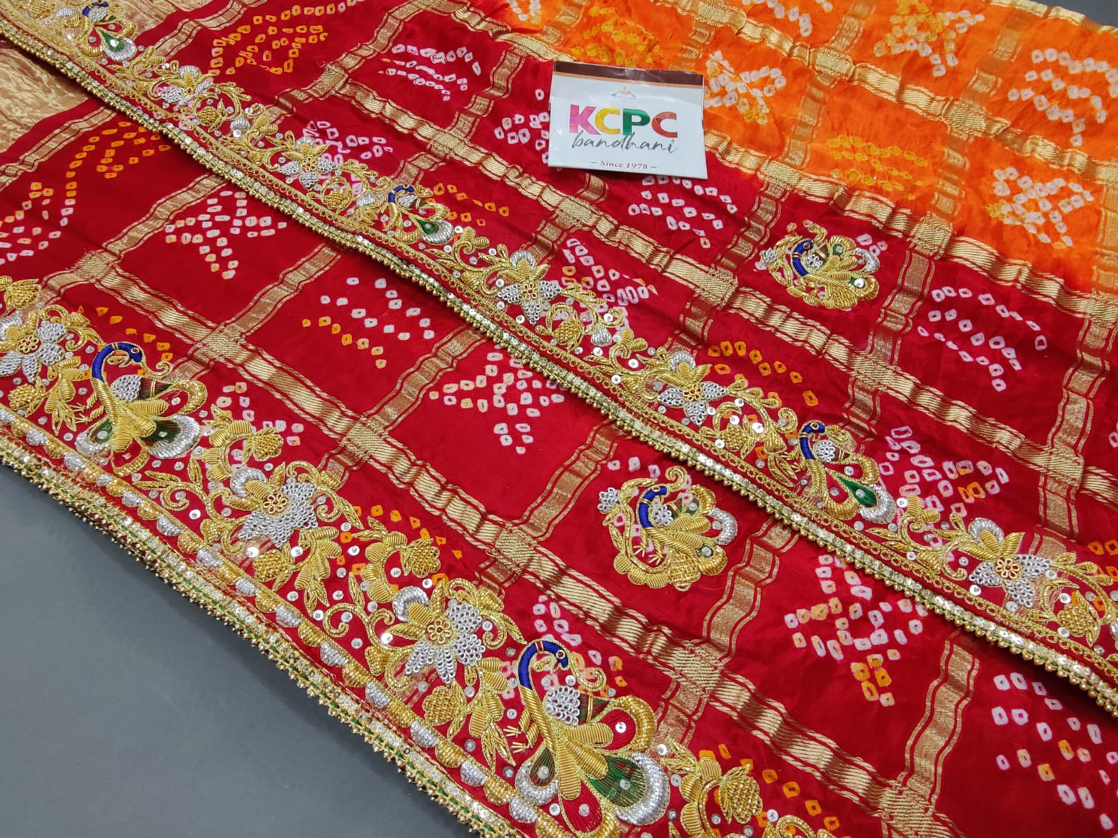 KcPc Mahajani Trending Pure Gaji Silk Bandhani Zardoji Ghatchola Chunri Pila Odhna (Red Orange)