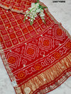 A red Gaji silk Bandhani saree Gota patti work