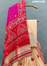 A traditional Indian lehanga with pure Gaji silk Jaipuri stylegotapatti work. 