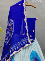 A blue traditional lehenga with gota patti work and bandhani style