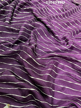 A purple dola silk saree with pearl gotapatti work 