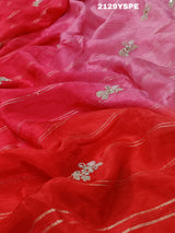 red saree with golden and silver embellishments and cutdana work, showcasing a traditional and festive design.