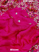 A red and gold Munga silk saree with Zardoji work and patola print style