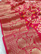 A red and gold Munga silk saree with Zardoji work and patola print style