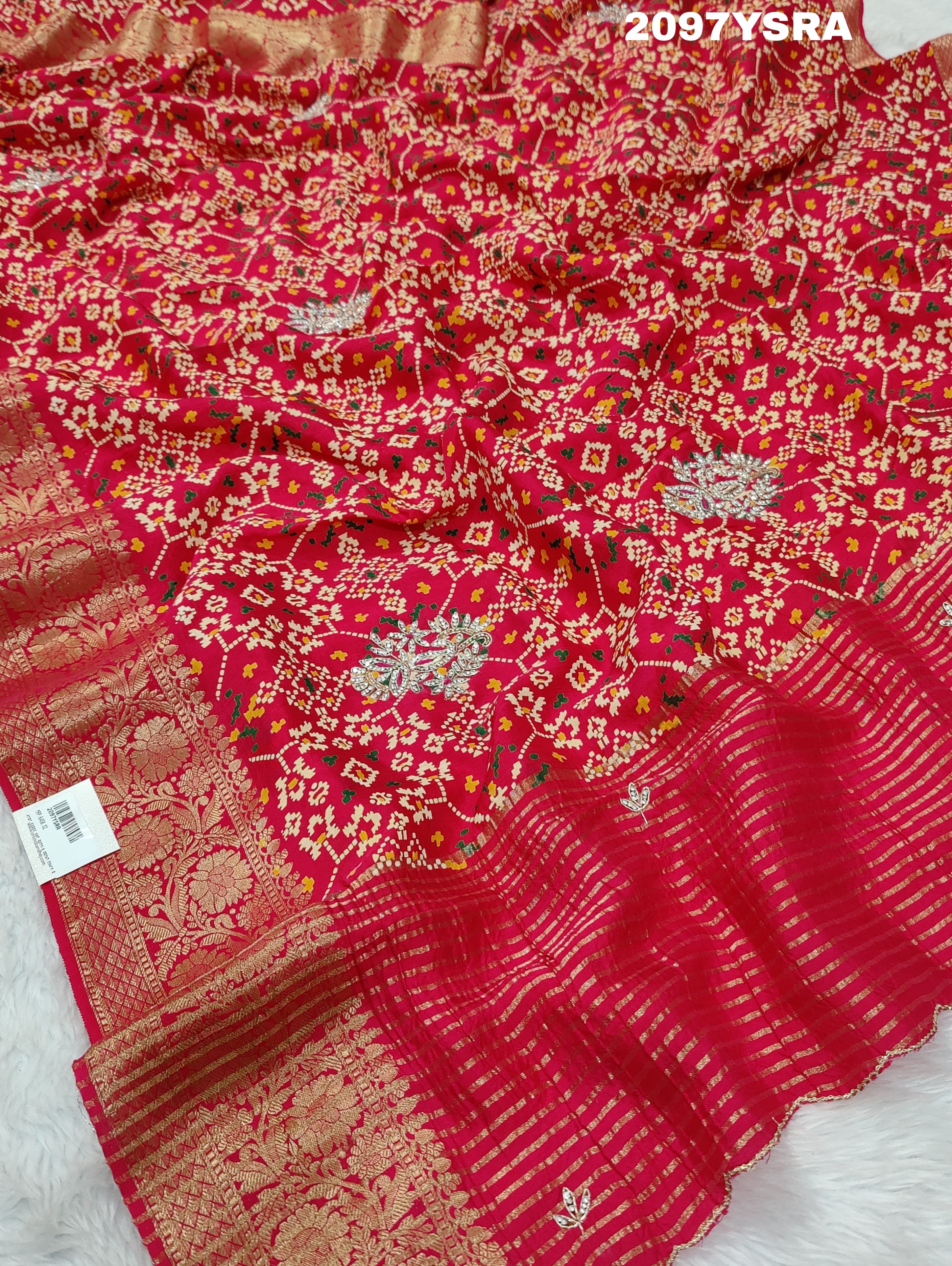 A red and gold Munga silk saree with Zardoji work and patola print style
