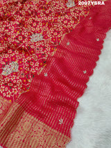 A red and gold Munga silk saree with Zardoji work and patola print style