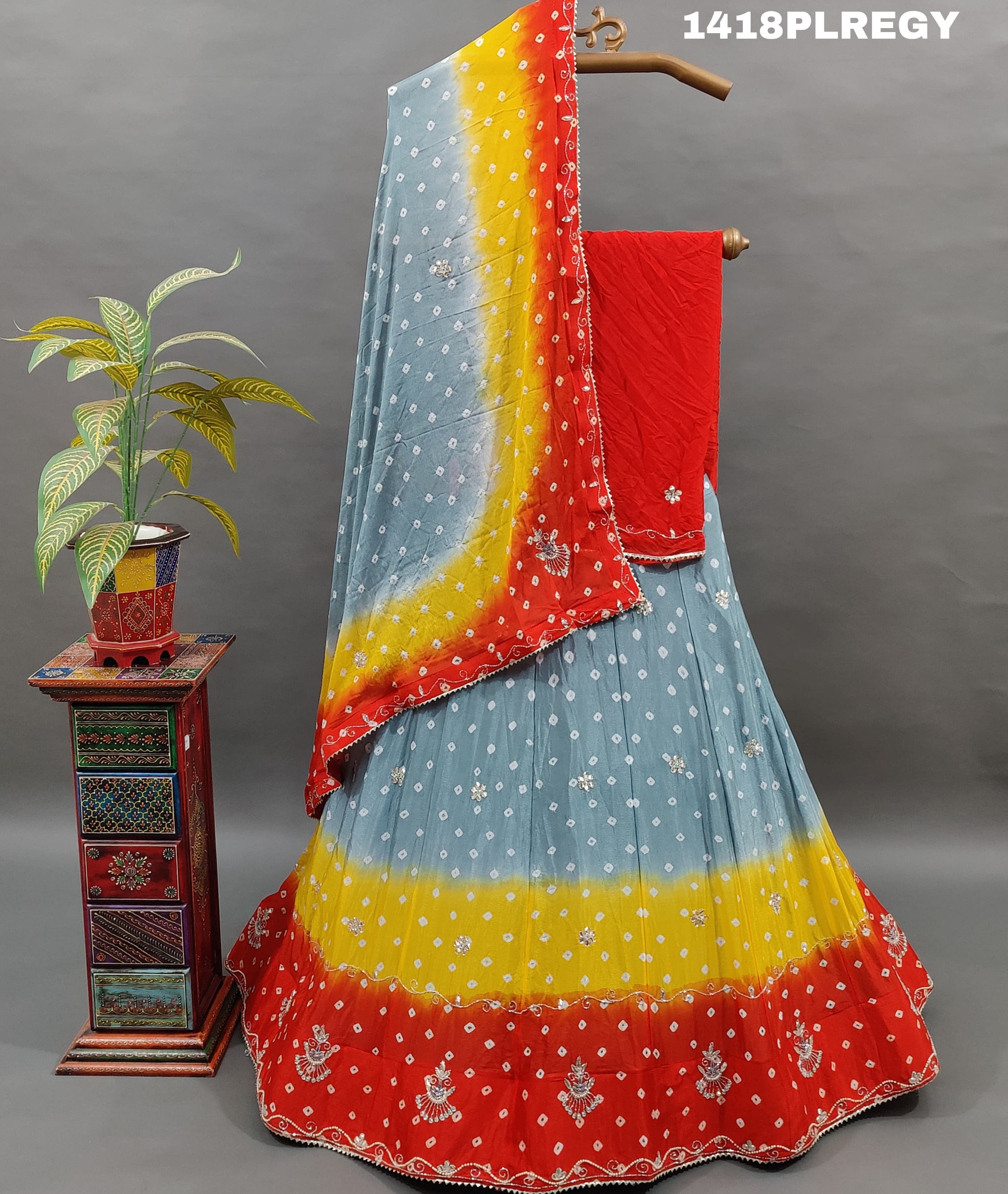 A traditional Indian lehenga with multicolor bandhani