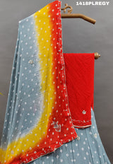 A traditional Indian lehenga with multicolor bandhani