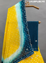 A traditional Indian lehenga with a multicolor bandhani pattern 
