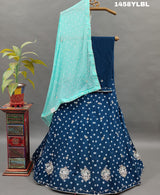 A traditional blue lehenga with bandhani style and cutdana work