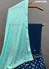 A traditional blue lehenga with bandhani style and cutdana work