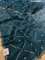 A blue saree with geometric gotapatti work embroidery 