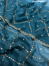 A blue saree with geometric gotapatti work embroidery 