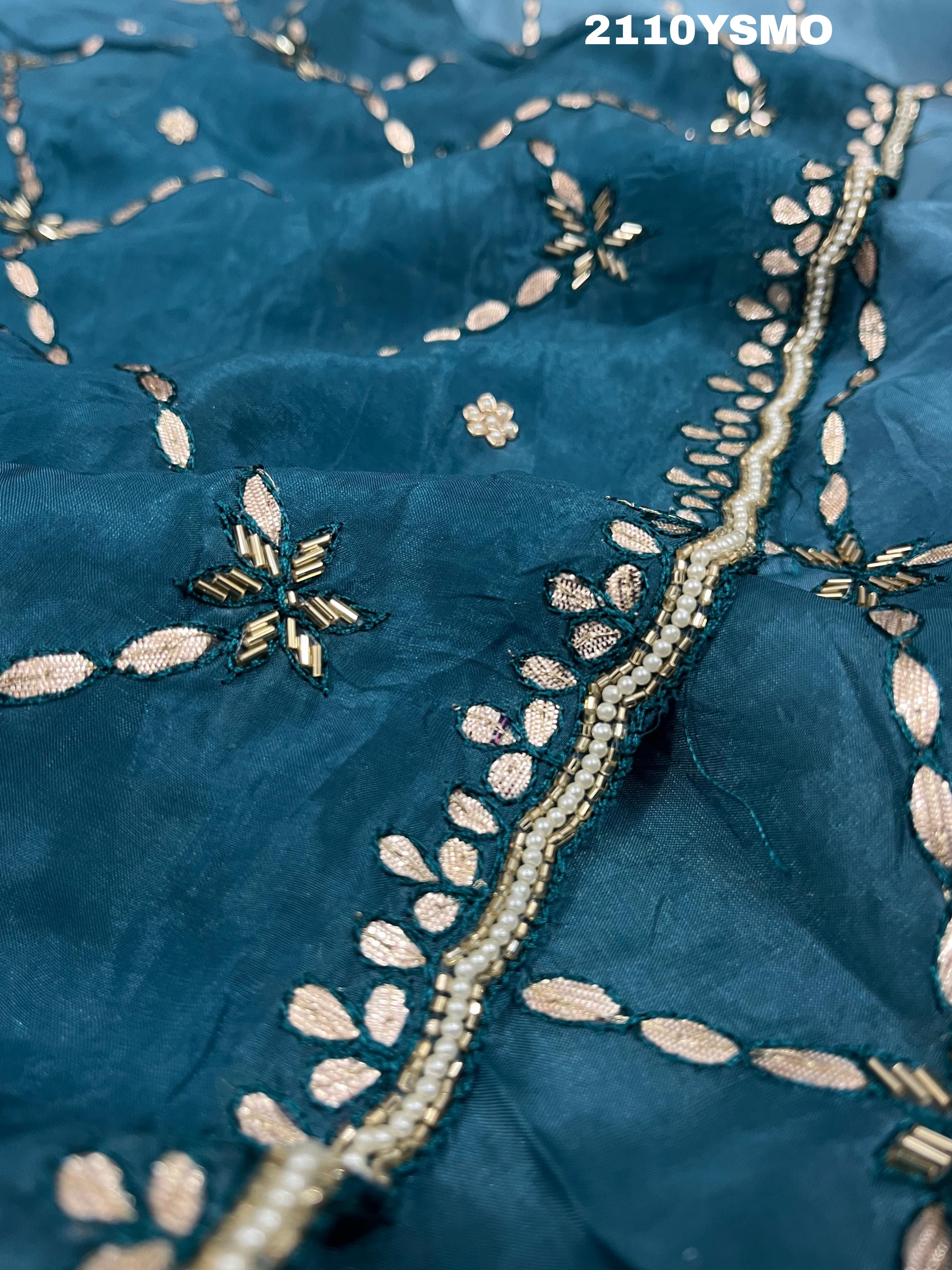 A blue saree with geometric gotapatti work embroidery 