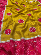 A yellow and red bandhani style dola silk saree with gota patti work