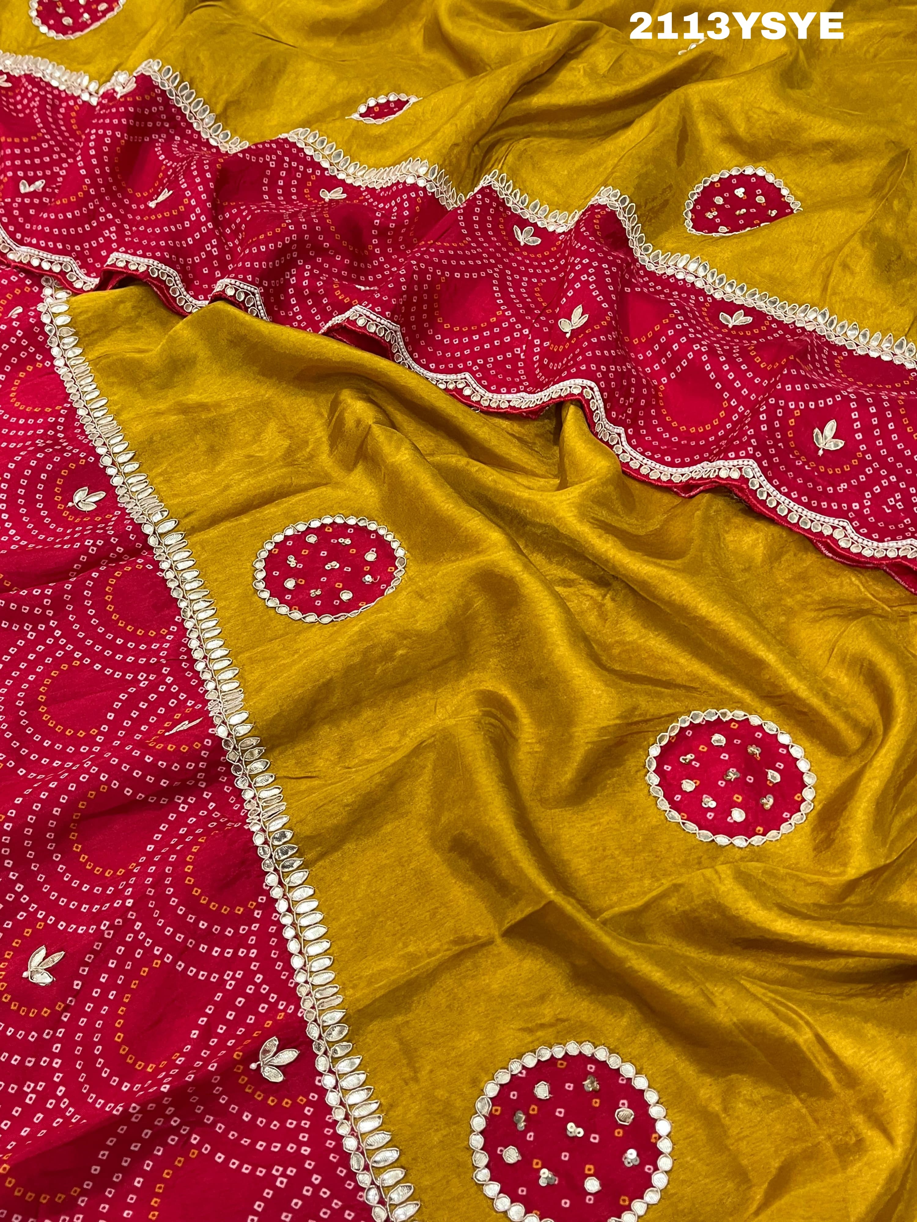 A yellow and red bandhani style dola silk saree with gota patti work