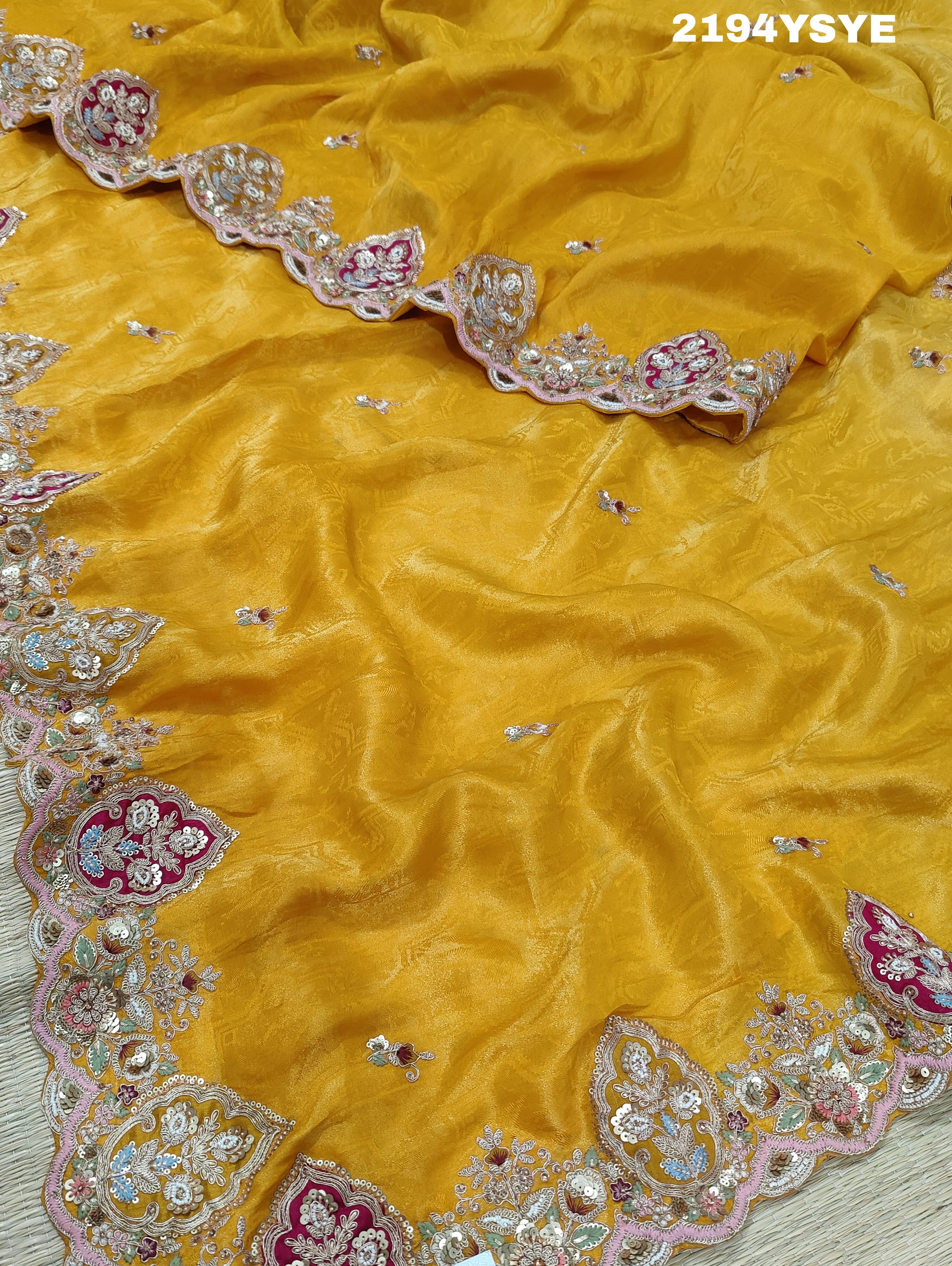 Yellow Banarasi silk saree with floral embroidery work 