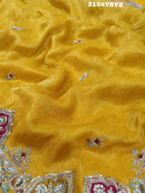 Yellow Banarasi silk saree with floral embroidery work 