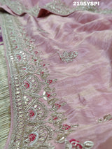 A pink tissue silk saree with traditional sequence Gotapatti work.
