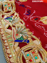 A red and orange Marwadi chunri Pure Ojariya Bel Buti Odhna