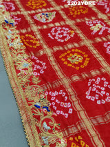 A red and multicolor pure Gaji silk bandhani odhana with zardozi work
