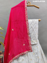 A Bollywood style Upada silk lehenga with cutdana and gotapatti work