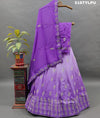 A traditional style purple lehenga with white bead work