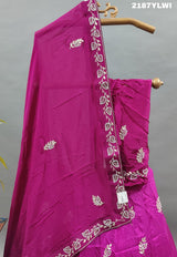 A traditional style Upada silk lehenga in pink with white bead work