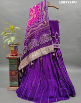 A traditional wear lehenga with bandhani style gotapatti work 