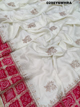 Munga Silk saree with Bandhani style embellishments and Gotapatti work, predominantly pink and white.