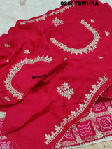 Munga Silk saree with Bandhani style embellishments and Gotapatti work, predominantly pink and white.