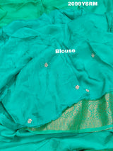 A green saree with floral zardozi work and Banarasi style 