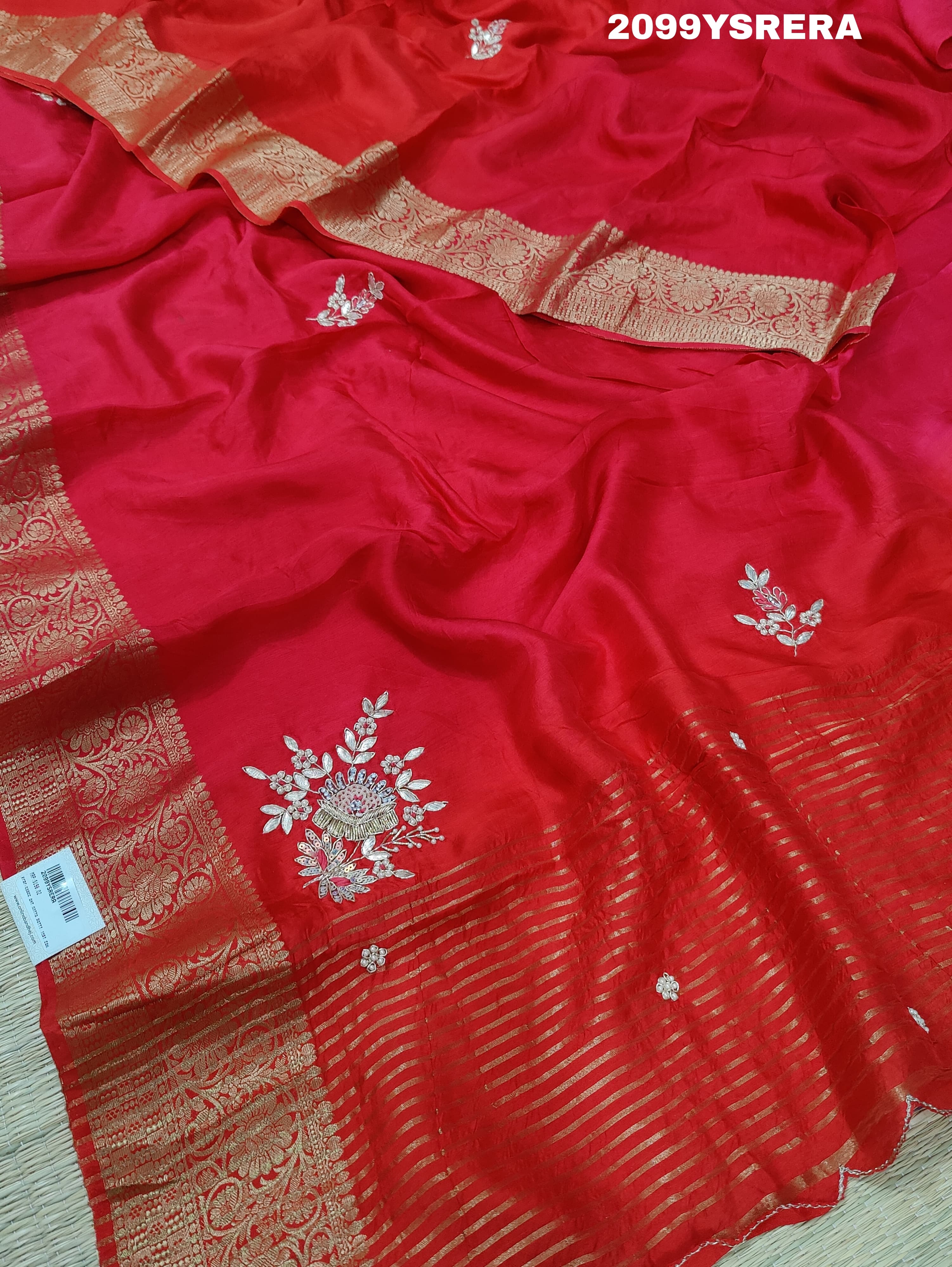 A red and gold Banarasi style silk saree with zardozi work, 
