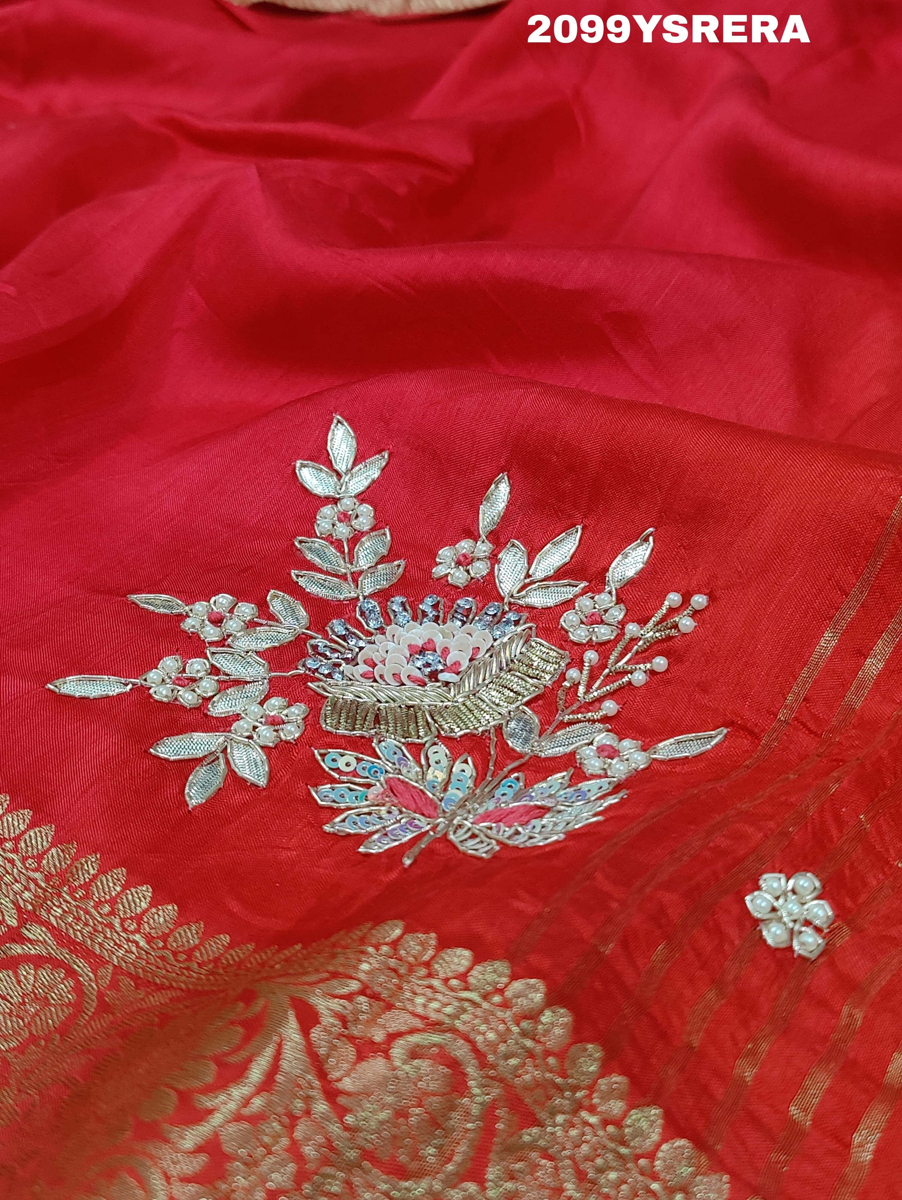 A red and gold Banarasi style silk saree with zardozi work, 