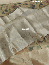 A yellow and blue floral patterned Tussar silk saree with Banarasi weaving.
