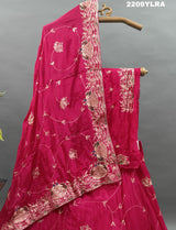 A traditional style pink Chinon silk lehenga with mukesh work