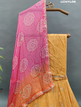 Traditional Indian lehenga choli with cutdana and gotapatti work