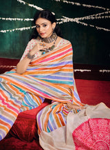 A multicolored cotton silk printed Bollywood saree with a traditional design, featuring stripes and floral patterns