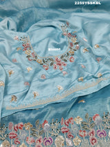 A blue saree with tissue silk fabric and Bollywood-style sequence embroidery work, including floral patterns and a border.