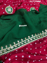 A red and blue modal silk bandhani saree with kachha gotapatti work, including intricate patterns and designs.