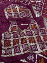 A wine saree with white patterns withCotton silk Bandhani Gotapatti Work Saree