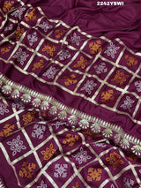 A wine saree with white patterns withCotton silk Bandhani Gotapatti Work Saree