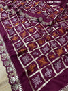 A wine saree with white patterns withCotton silk Bandhani Gotapatti Work Saree